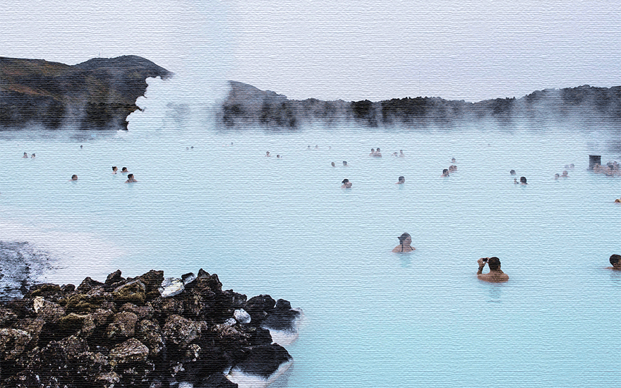 Image of a hot spring with many people bathing in it